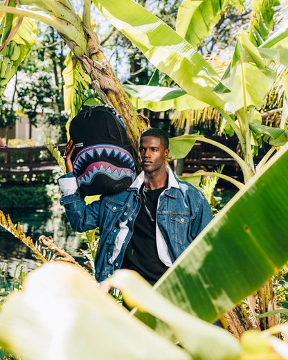 Sprayground A.I. AFRICAN INTELLIGENCE BORN AND RAISED BACKPACK - SANDFLOWER COLLAB