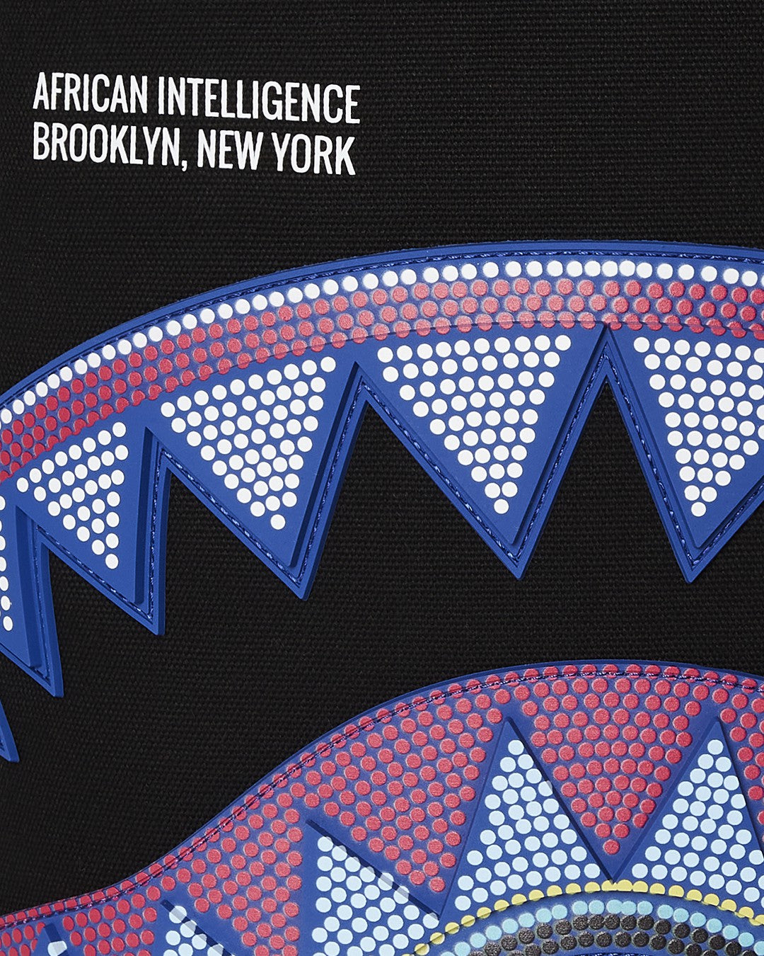 Sprayground A.I. AFRICAN INTELLIGENCE BORN AND RAISED BACKPACK - SANDFLOWER COLLAB