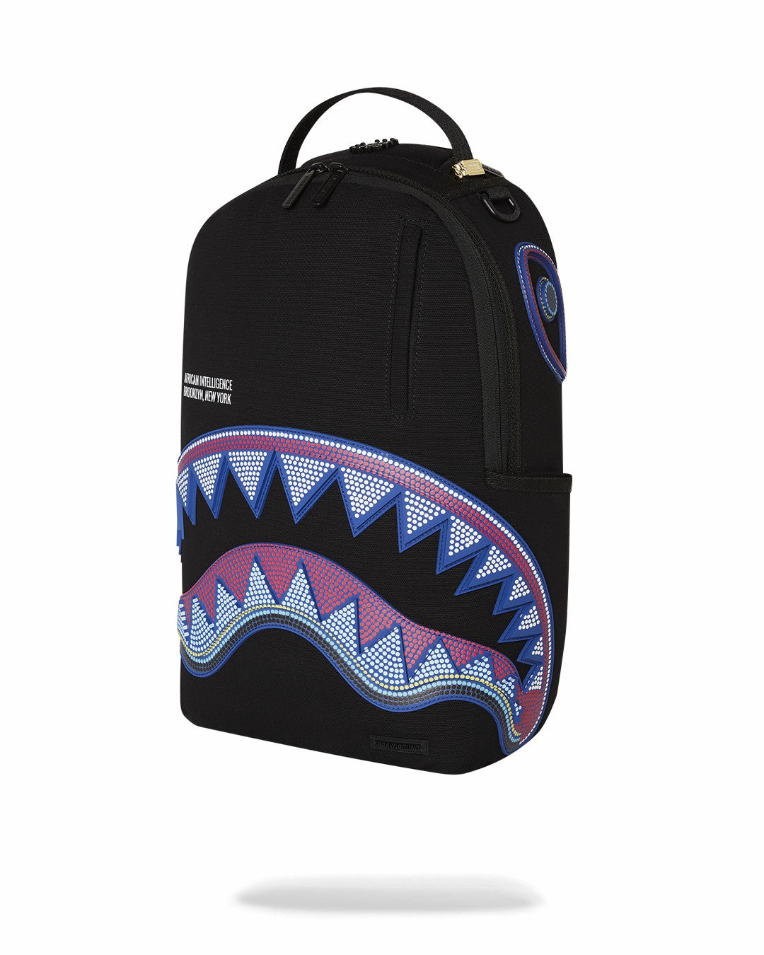 Sprayground A.I. AFRICAN INTELLIGENCE BORN AND RAISED BACKPACK - SANDFLOWER COLLAB
