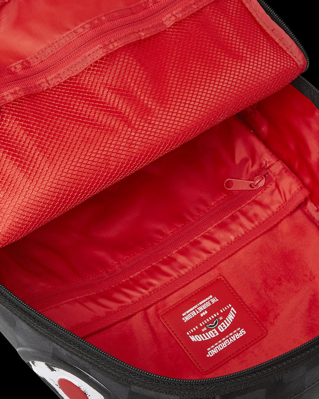 Sprayground SNOOPY ART BITE DLXSV BACKPACK
